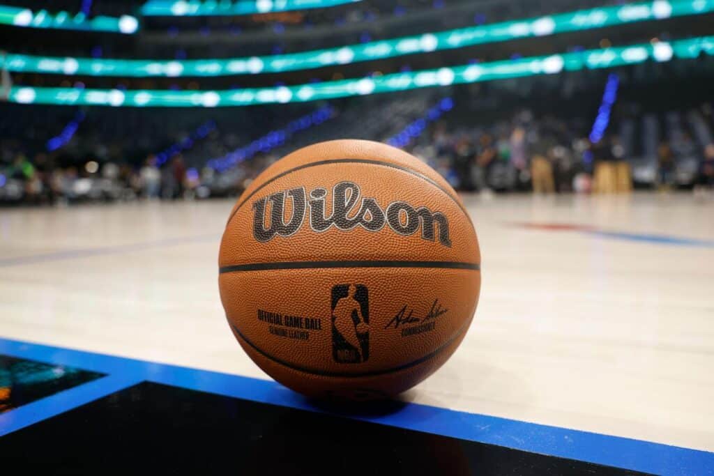 A Wilson NBA official game ball with Adam Silver's name and the NBA logo is seen in a closeup view before Game 6 of the NBA basketball second-round playoff series between the Oklahoma City Thunder and the Dallas Mavericks, Saturday, May 18, 2024, in Dallas. (Matt Patterson via AP)